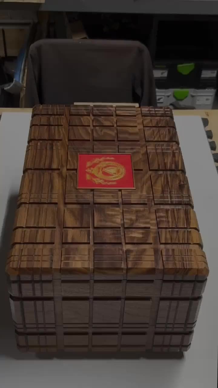 Constant and True puzzle box, its drawers open on red suede