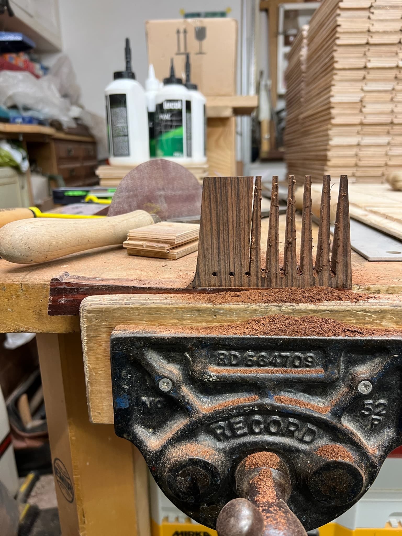 Cutting the comb's teeth, the blank held in a Record vise