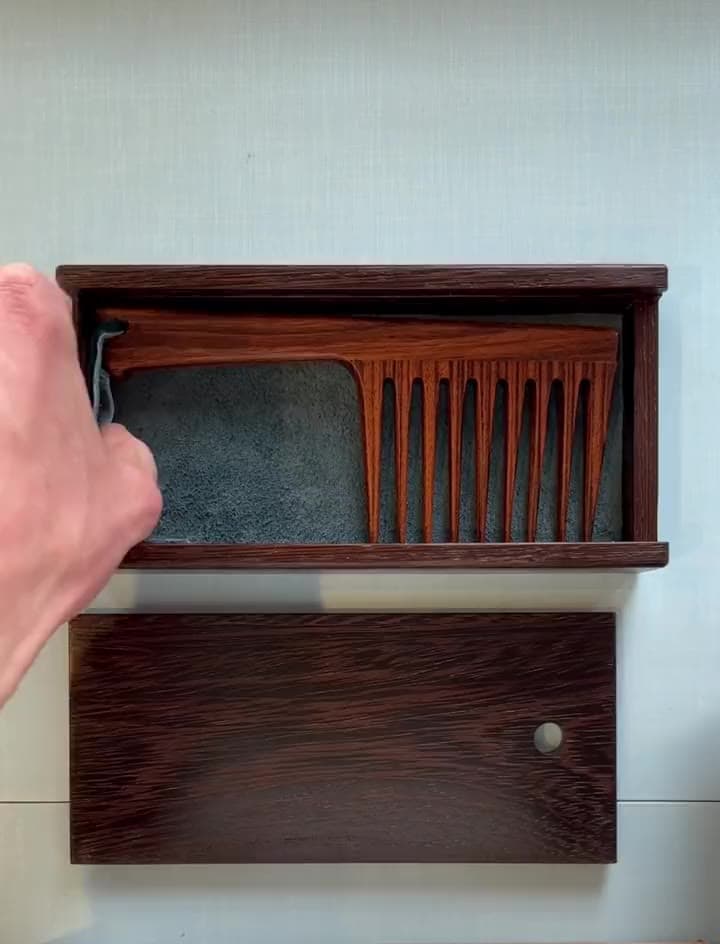 The tiger wood comb in its suede-lined wenge case